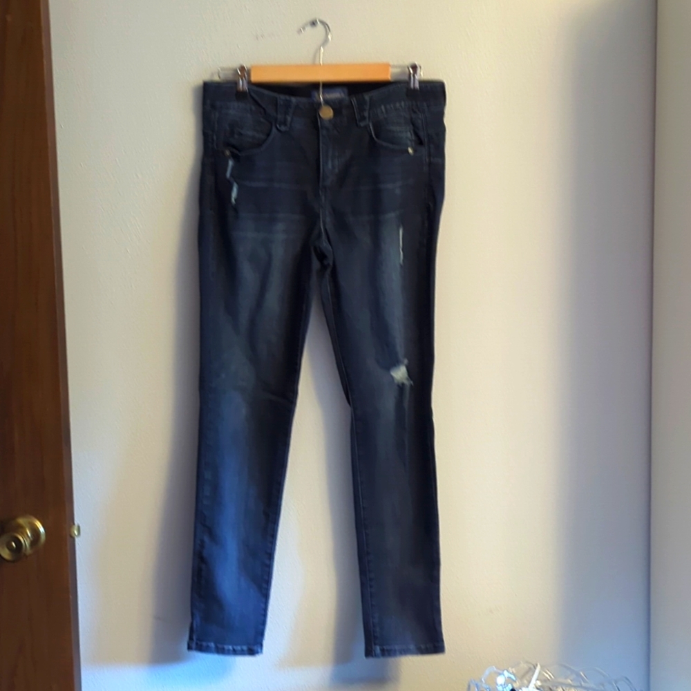 Dark Jeans with subtle distressing